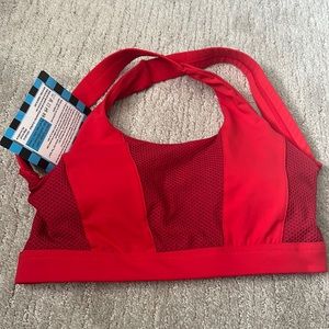 Strappy red sports bra